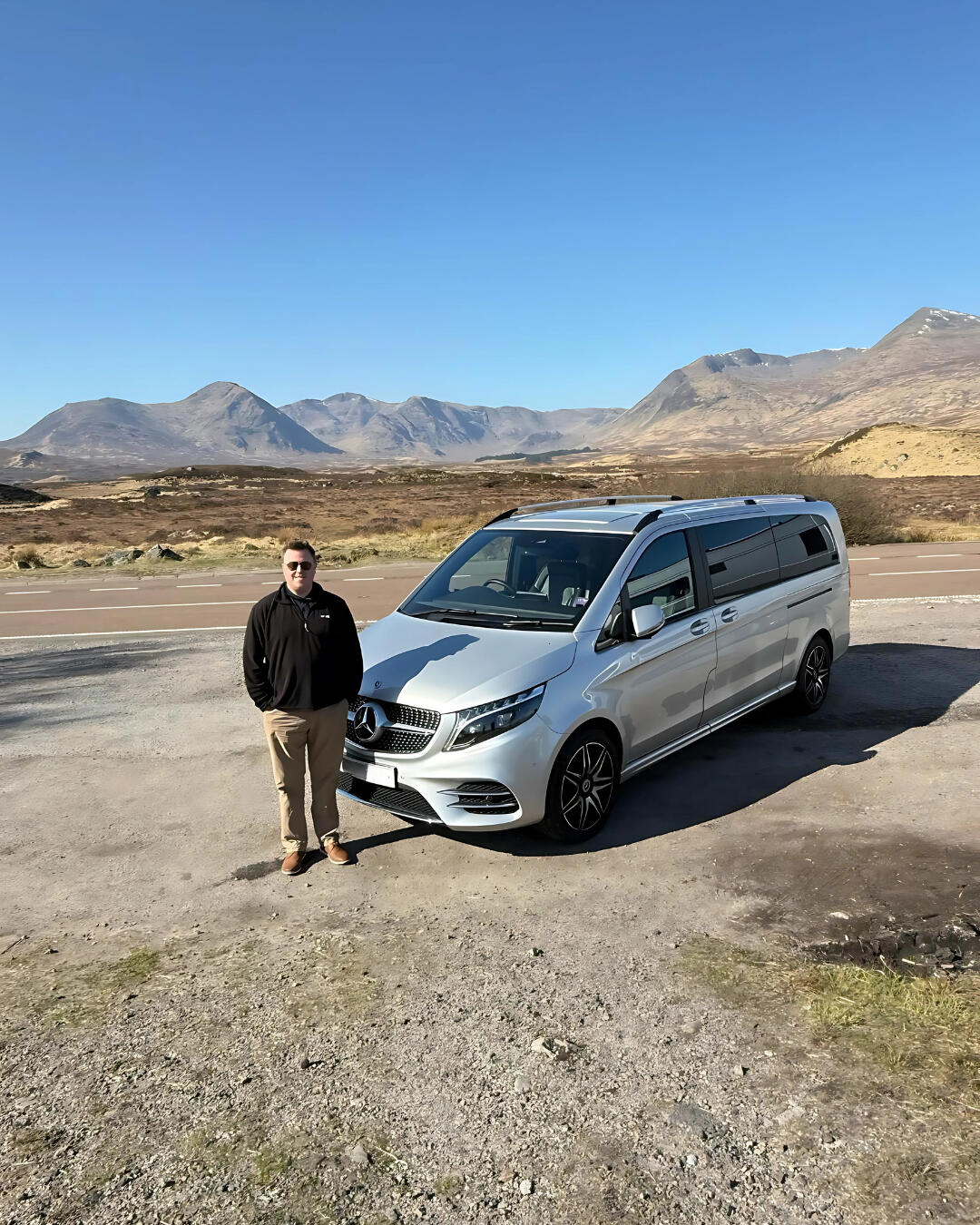 Tom Connor - Scottish Tour Guide Tom Connor, founder of Tom's Scottish Tours, overlooking the Scottish Highlands.